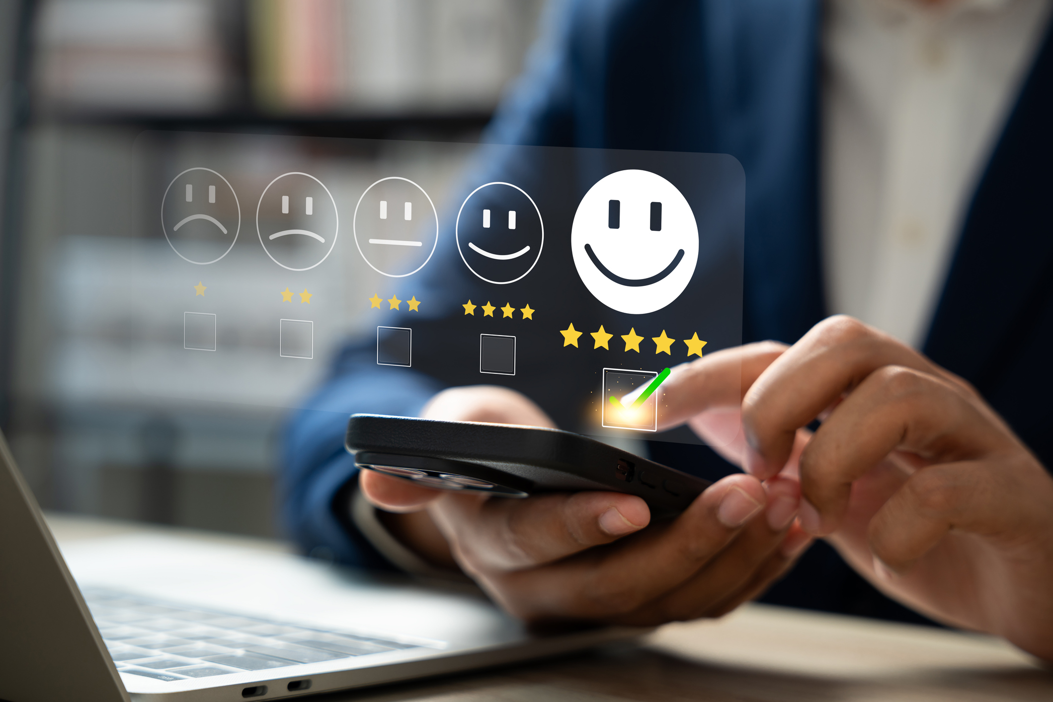 Positive customer review concept; Person using a smartphone to rate small business from one star to five.